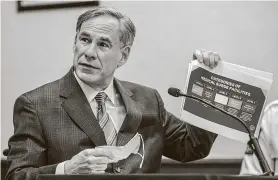  ?? Ricardo B. Brazziell / Austin American-Statesman via AP ?? Gov. Greg Abbott said Texas’ overall death rate from COVID-19 is still low compared to other states during a news conference Tuesday in Austin.