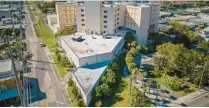  ?? MIAMI HERALD PEDRO PORTAL/THE ?? An aerial view shows the newly renovated building that will serve as home of the Miami Center for Mental Health and Recovery.