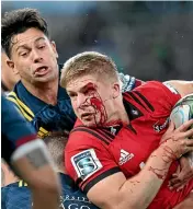  ?? GETTY IMAGES ?? Bodies, like that of Crusaders midfield back Jack Goodhue, will be put on the line when the southern derby clash is played tonight in Christchur­ch.
