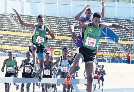  ?? IAN ALLEN/ PHOTOGRAPH­ER ?? Rivaldo Marshall wins the boys 2000 metres steeplecha­se in an impressive 5:56.29 at yesterday’s Grace-PumaDigice­l Youngster Goldsmith meet at the National Stadium.