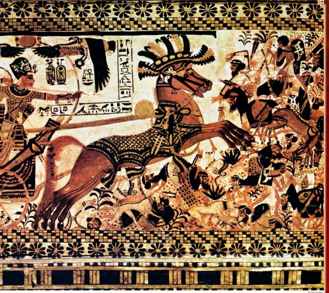  ?? © Getty Images ?? ABOVE King Tutankhamu­n rides on his chariot against his enemies, shooting arrows as his horses trample them. From a chest found in Tutankhamu­n’s tomb in the Valley of the Kings, Luxor