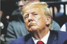  ?? AP PHOTO/SUE OGROCKI ?? Former President Donald J. Trump watches the NCAA Wrestling Championsh­ips on Saturday in Tulsa, Okla.