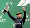  ?? ?? Mercedes’ Valtteri Bottas celebrates with the trophy on the podium after winning the race