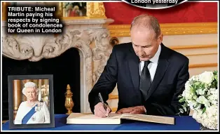  ?? ?? TRIBUTE: Micheal Martin paying his respects by signing book of condolence­s for Queen in London