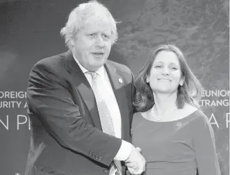  ??  ?? Canadian Foreign Affairs Minister Chrystia Freeland meets British Foreign Secretary Boris Johnson during the meeting Tuesday on security and stability on the Korean Peninsula.