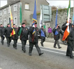  ??  ?? Members of Slane ONE lead the St Patrick’s Day parade in Slane.