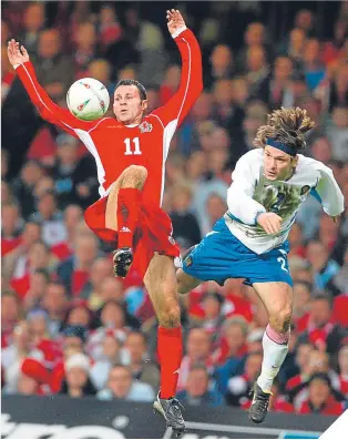  ??  ?? ■ Ryan Giggs was in the Welsh side which lost to Russia in Cardiff back in 2003, a match Gareth Bale watched from the stands with his dad.