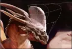  ??  ?? Concept artist James Wolf Strehle explains how to use the Warp tool to adjust the shape of a dragon’s head.