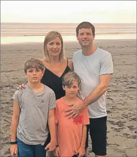  ?? CP PHOTO ?? Shanna and Brett Doyle are seen with their sons, Cole, 10, and Simon, 8, in this undated family handout photo.