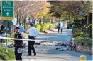  ?? CRAIG RUTTLE/AP ?? Bicycles and debris lay on a bike path Tuesday after a motorist drove onto the path near the World Trade Center memorial, striking and killing several people.