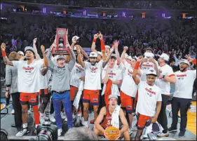  ?? Frank Frankllin II The Associated Press ?? Florida Atlantic players celebrate after defeating Kansas State on Saturday to reach the Final Four for the first time in school history.