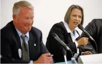  ?? LUIS SÁNCHEZ SATURNO/THE NEW MEXICAN ?? Land commission­er candidates Republican Patrick Lyons and Democrat Stephanie Garcia Richard take part Wednesday in a League of Women Voters of Santa Fe County candidate forum at Santa Fe Community College.