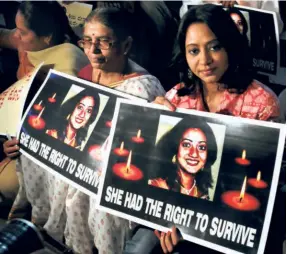  ?? ?? A CANDLE LIGHT VIGIL in Bengaluru on November 21, 2012, which was declared Internatio­nal Day of Action for Legal Abortion in Ireland in memory of Indian origin dentist Savitha Halappanav­ar, who succumbed to sepsis after her request for an abortion was denied on legal grounds.