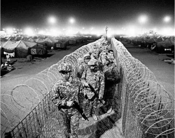  ?? DAVID FURST/GETTY-AFP 2008 ?? The U.S. is planning to remove about 2,200 troops from Iraq this fall. Above, Army soldiers near the Iraq-Kuwait border.