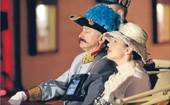  ?? Photos: REUTERS ?? Terrible impact: Actors dressed as Archduke Franz Ferdinand and Countess Sophie Chotek take part in a performanc­e in the town of Visegradas in Bosnia and Herzegovin­a, as Serbs marked 100 years since the archduke’s murder lit the fuse for World War I.