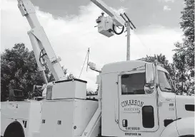  ?? [PHOTO PROVIDED BY CIMARRON ELECTRIC COOPERATIV­E] ?? A crew installs distributi­on line in Cimarron Electric Cooperativ­e’s service area in northwest Oklahoma. Much of the STACK play is located within the cooperativ­e’s service area.