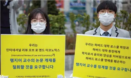  ??  ?? A rally in Seoul, South Korea, condemns Harvard Law School professor J Mark Ramseyer. Photograph: Chris Jung/NurPhoto/REX/ Shuttersto­ck