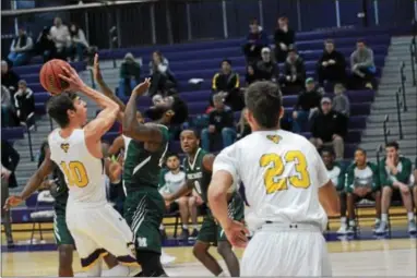  ?? MICHAEL REEVES — FOR DIGITAL FIRST MEDIA ?? West Chester’s Jackson Hyland gets off a shot against Mercyhurst on Saturday.