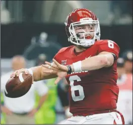  ?? The Associated Press ?? NFL DRAFT: In this Dec. 2, 2017, file photo, Oklahoma quarterbac­k Baker Mayfield (6) throws a pass in the first half of the Big 12 Conference championsh­ip game against TCU in Arlington, Texas.