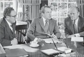  ?? Harvey W. Georges Associated Press ?? PRESIDENT NIXON, with Secretary of State Henry Kissinger, left, and vice presidenti­al nominee Gerald Ford in 1973, declined face-to-face CIA briefings.