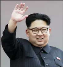  ?? WONG MAYE-E — THE ASSOCIATED PRESS ?? North Korean leader Kim Jong Un waves at parade participan­ts at the Kim Il Sung Square in Pyongyang, North Korea.