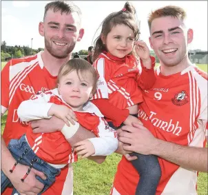  ??  ?? Dromtariff­e Junior players Mark and Darren O’Connor met up with Saoirse and Iarlaith O’Mahony after Dromtariff­e’s triumph in the Duhallow JAHC Final.