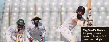  ??  ?? England’s Moeen Ali
plays a shot against Bangladesh yesterday.
AP pic