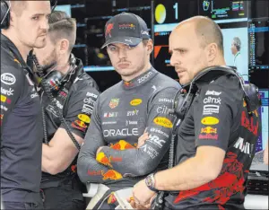  ?? Andre Penner The Associated Press ?? Heading into the season finale, Red Bull driver Max Verstappen, center, has already wrapped up the season title on the strength of 14 victories.