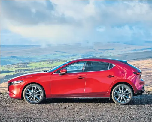  ??  ?? The new Mazda 3 is a sharp-looking hatchback with a smart interior