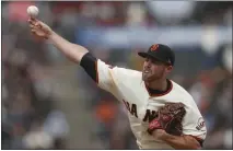  ?? NHAT V. MEYER — BAY AREA NEWS GROUP, FILE ?? Sam Coonrod throws against the Diamondbac­ks at Oracle Park in May 2019. Coonrod on Saturday was traded to the Phillies in exchange for pitching prospect Carson Ragsdale.