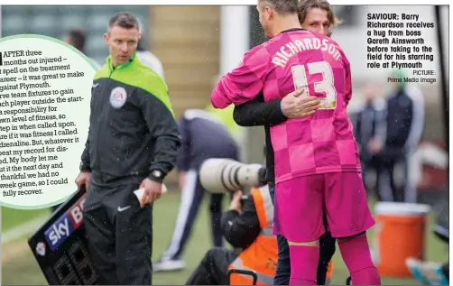  ?? PICTURE: Prime Media Image ?? SAVIOUR: Barry Richardson receives a hug from boss Gareth Ainsworth before taking to the field for his starring role at Plymouth