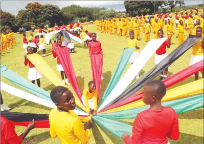  ??  ?? Children rehearse ahead of the independen­ce celebratio­ns at the National Sports Stadium in Harare yesterday. — (Picture by Innocent Makawa)