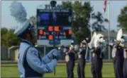  ?? ERIC BONZAR — THE MORNING JOURNAL ?? Lorain High School’s Marching Titans Band warms up fans prior to the school’s 2017 football season kick-off against the Midview Middies, Aug. 25.