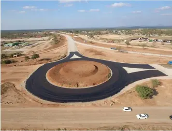  ?? — Picture: Thupeyo Muleya ?? SHAPING UP . . . Work on the dual carriagewa­y along the Beitbridge to Harare and Beitbridge to Bulawayo roads is almost complete. The project is being carried out by Bitumen World as part of the Government’s programme of upgrading major highways.