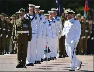  ?? (AP/AAP Image/Mick Tsikas) ?? An honor guard forms Thursday at Australian Defense Headquarte­rs, before findings from the inspector-general of the Defense Force Afghanista­n Inquiry were released in Canberra, Australia.