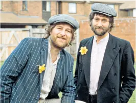  ??  ?? Hodges, above left, with Dave Peacock and, below, at the piano; right, their 1979 album Don’t Give a Monkey’s …: they fused Cockney pub knees-up with music-hall humour and boogie-woogie piano