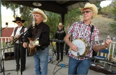  ?? Dan Watson/ The Signal ?? The Grateful Dudes Western Band entertains at the Silents Under the Stars fundraisin­g event for the Friends of Hart Park, which was held at William S. Hart Park in Newhall on Saturday.