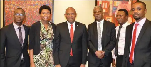  ??  ?? L-R: Some Ebola Survivors, First Consultant­s Medical Centre, Dr. Akiniyi Fadipe; Dr. Ada Igonoh; Chairman, Heirs Holdings, Tony O. Elumelu; Chief Medical Director, FCMC, Dr. Benjamin Ohiaeri; Ebola Survivor, FCMC, Dr. Adewale Adejoro and Ebola...