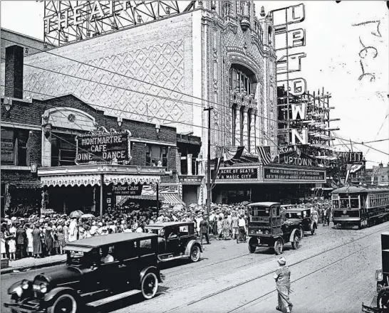  ?? CHICAGO TRIBUNE ?? People line up to see the Uptown Theatre, located at Broadway and Lawrence Avenue, during opening week in August 1925. The theater was built by Balaban & Katz.