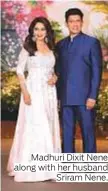  ??  ?? Madhuri Dixit Nene along with her husband Sriram Nene.