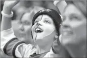  ?? NHAT V. MEYER — BAY AREA NEWS GROUP, FILE ?? A young Sharks fan cheers during their game against the Blues in the 2019 Western Conference final at the SAP Center in San Jose.