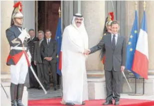  ?? EFE ?? El emir de Qatar y Nicolás Sarkozy, en 2009 en el Elíseo