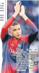  ?? AFP photo — ?? Mbappe cheers to supporters during warm up before the French L1 football match between Paris Saint-Germain (PSG) and Toulouse (TFC) at the Parc des Princes stadium in Paris.