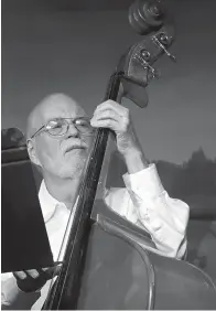  ?? (Photo by Neil Abeles) ?? Returning to the Hickory Hill band for a two-hour performanc­e is Bob Stegall playing on the string bass.