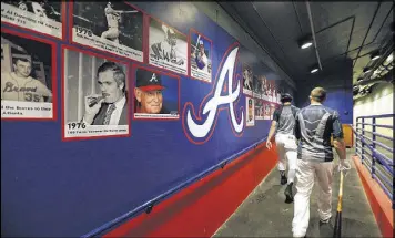  ?? CURTIS COMPTON / CCOMPTON@AJC.COM ?? Braves players Dansby Swanson (left) and Jace Peterson have had to deal with the subpar facilities at ESPN Wide World of Sports.