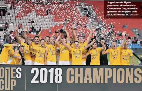  ?? /IMAGO7 ?? Jugadores de Tigres presumen el trofeo de la Campeones Cup, el cual le ganaron al campeón de la MLS, el Toronto FC .