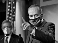  ?? AP PHOTO/J.
SCOTT APPLEWHITE ?? Senate Majority Leader Chuck Schumer, D-N.Y., and Majority Whip Dick Durbin, D-Ill. (left) take questions from reporters about President Joe Biden’s nominees, during a news conference at the Capitol in Washington, on Tuesday.