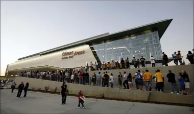  ?? ASSOCIATED PRESS FILE ?? In this Oct. 24, 2008photo, fans line up for the grand opening of the Citizens Business Bank Arena before the Lakers play the Thunder in an NBA preseason game in Ontario, Calif.