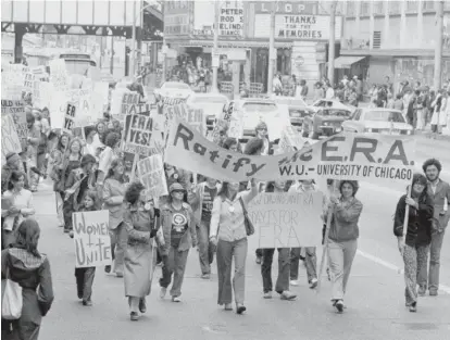  ?? SUN- TIMES FILE PHOTO ?? An Equal Rights Amendment march in Chicago in 1978.