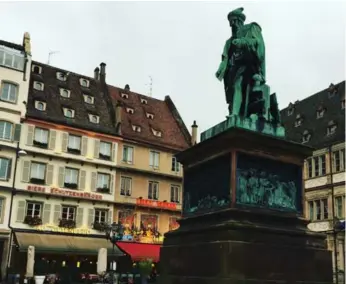  ?? WILL HAWKES FOR THE WASHINGTON POST ?? A statue of Johannes Gutenberg, the father of printing in Europe, looks over Place Gutenberg in Strasbourg, France.